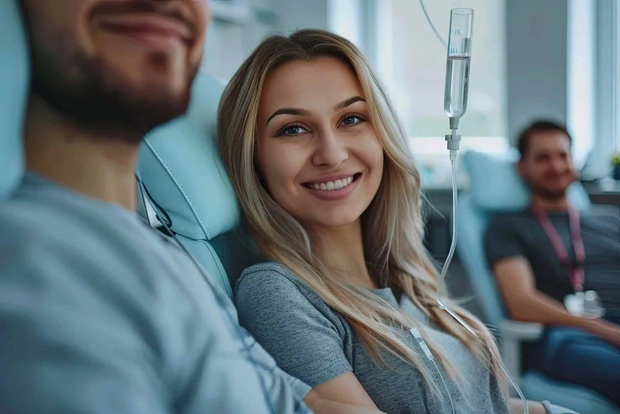 A young woman getting Vitamin IV Therapy in Santee, CA by The Wellness Co.