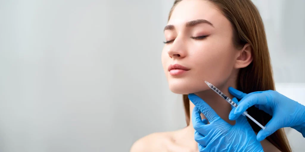 Lady receiving dermal fillers injectable at Santee, CA by The Wellness Co.